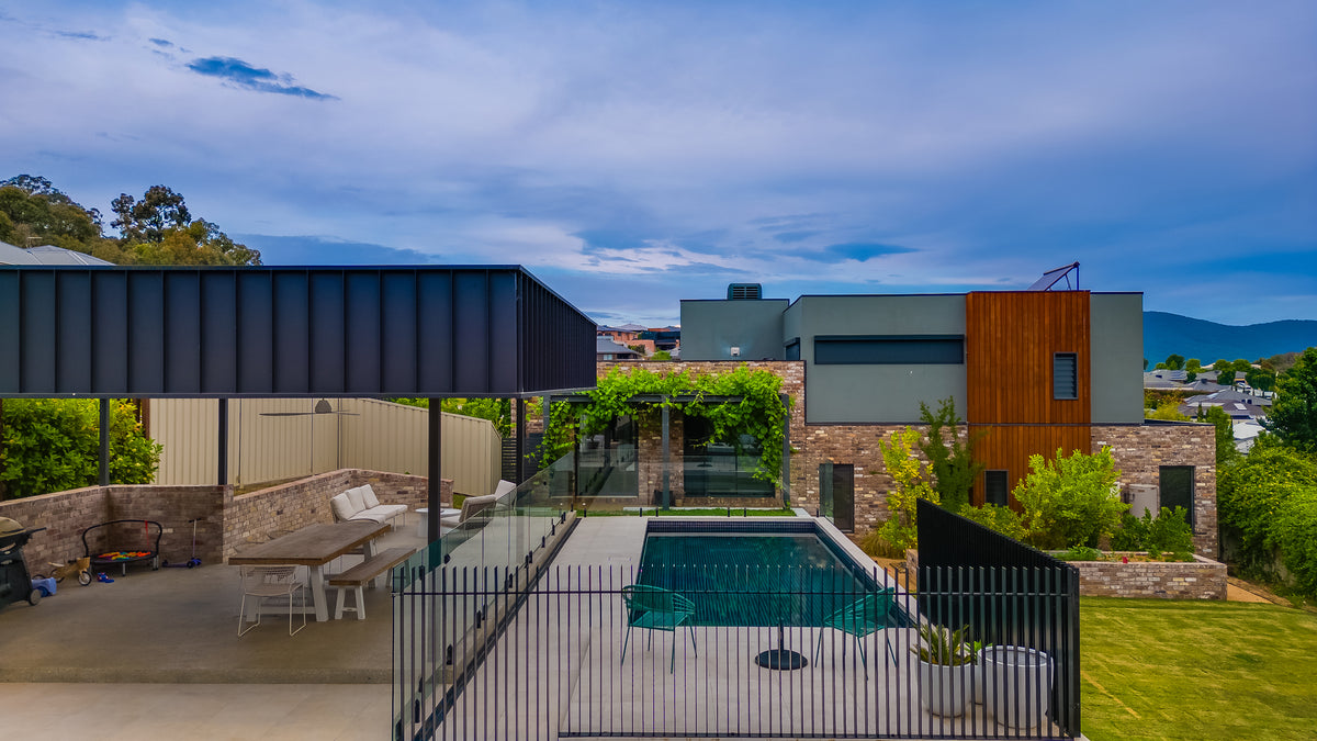 Sloping Sanctuary – Wodonga South | H20 Custom Pools | Custom Concrete ...